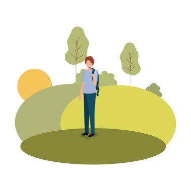 parkta okul çantası ile genç adam