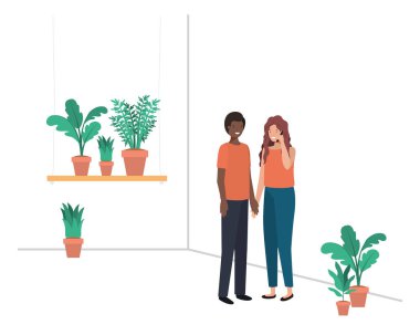 ev bitki ve akıllı telefon ile genç çift