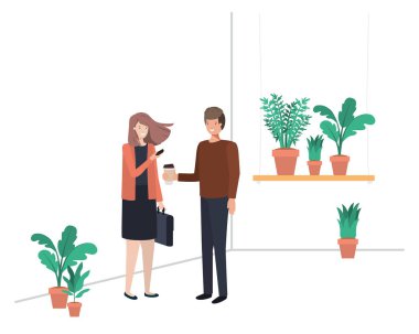 ev bitki ve akıllı telefon ile genç çift