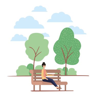 parkta sandalyede oturan genç kadın