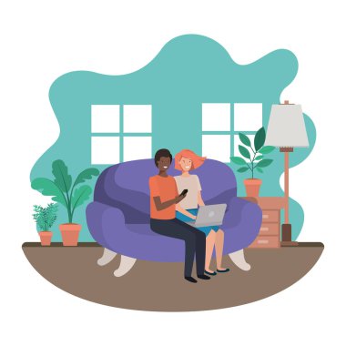 oturma odasında dizüstü bilgisayar kullanan çift