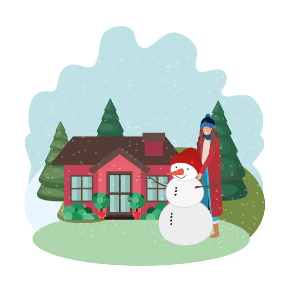 Kardan adamla ve kışın eviyle bir kadın — Stok Vektör
