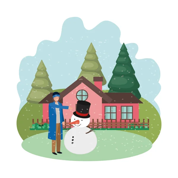 Kışın kardan adam ve ev — Stok Vektör