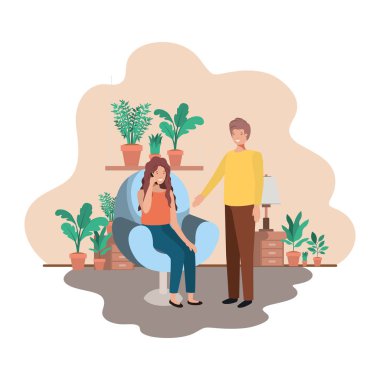 oturma odasında akıllı telefon kullanan çift