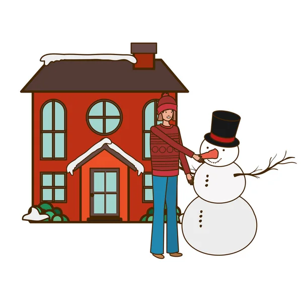 Man med snögubbe utanför huset — Stock vektor