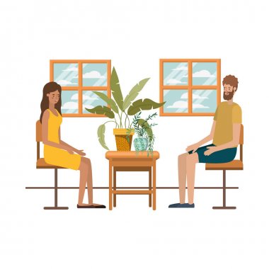 Oturma odasında kahve içen çift.