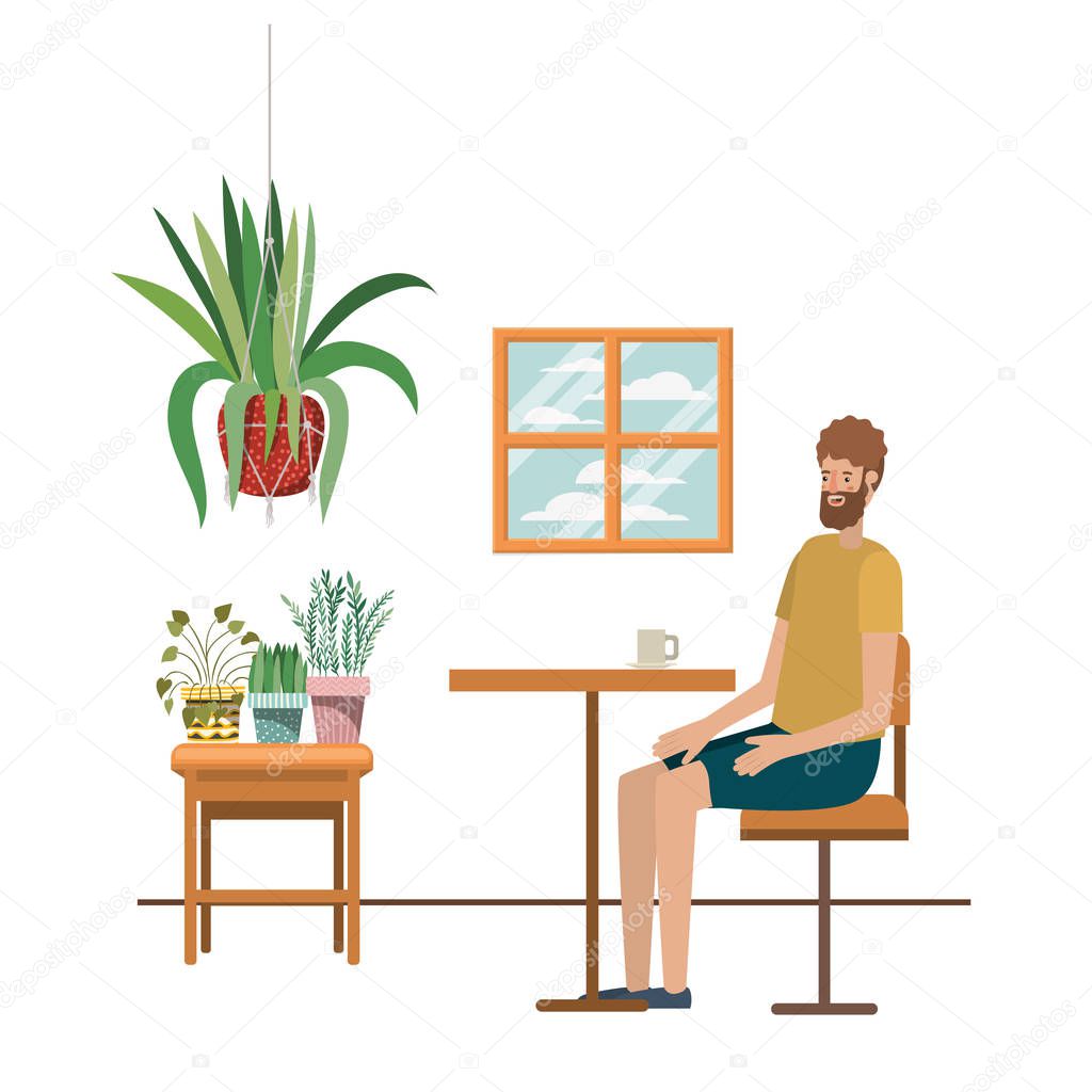 man drinking coffee in the living room