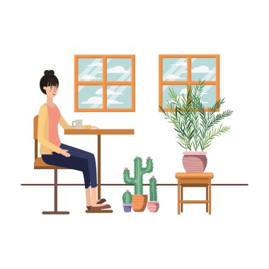 Kadın oturma odasında kahve içiyor.