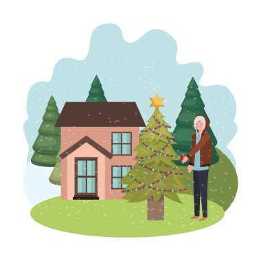 evin dışında noel ağacı ile adam