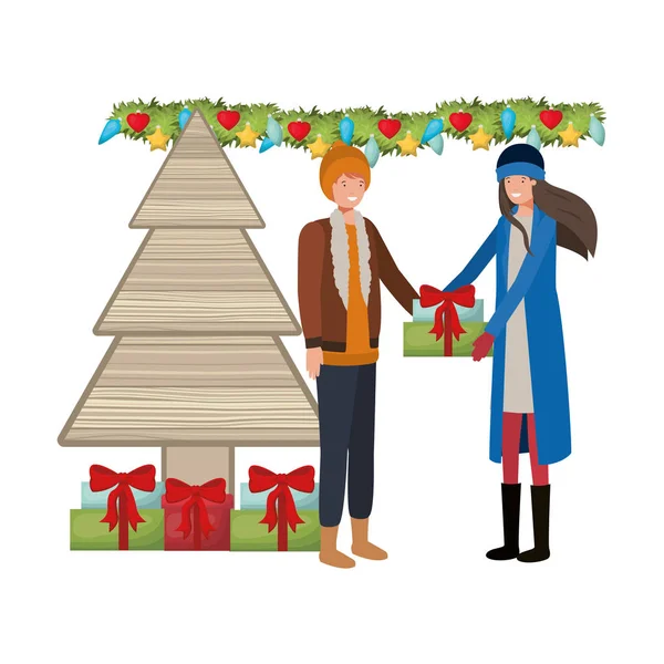 Pár a karácsonyfa és ajándékok avatar karakter — Stock Vector