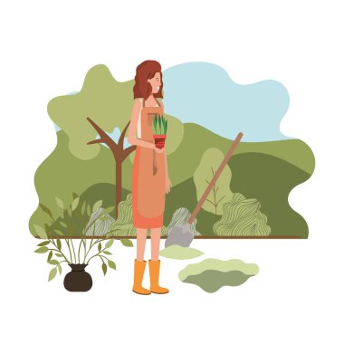 Ağaçlı bir kadın manzarada dikmek için