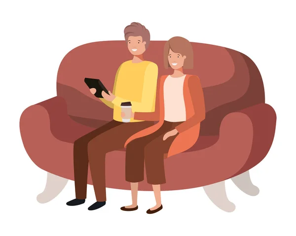 Coppia utilizzando tablet nel carattere divano avatar — Vettoriale Stock