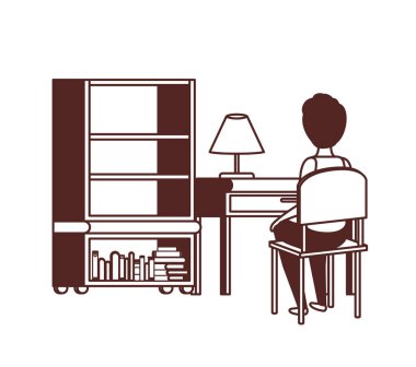 okul masasında oturan adam öğrenci