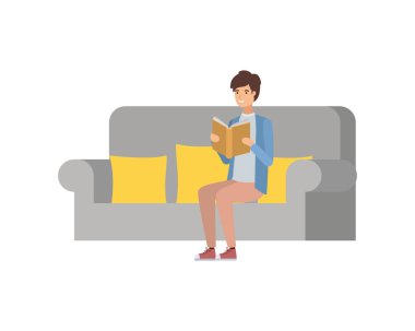 elinde kitap ile sandalyede oturan adam