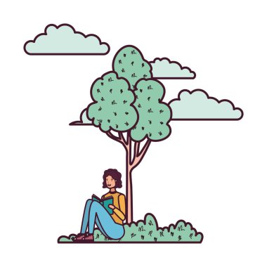 Genç adam ağaçlar ve bitkilerle manzarada