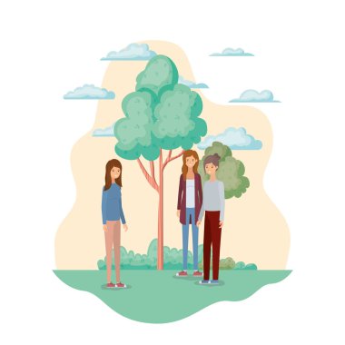 Ağaçlar ve bitkilerle manzarada genç kadınlar