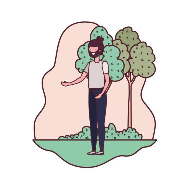 Genç adam ağaçlar ve bitkilerle manzarada