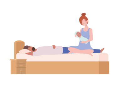 yeni doğmuş bir bebek ile yatakta genç çift