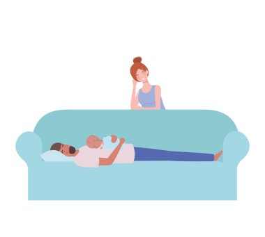 woman and man with newborn baby sitting on sofa