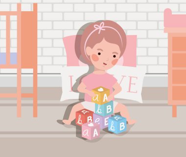 alfabe blokları ile oynayan küçük bebek kız