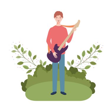 elektrik gitar ve dalları ile adam ve arka planda bırakır