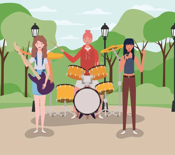 kampta enstrüman çalan bir grup kadın