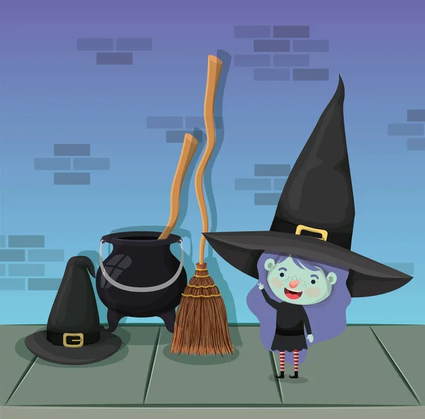 魔女の衣装と大鍋とほうきを持つ小さな女の子 — ストックベクタ