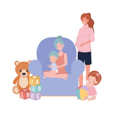 oturma odasında küçük bebekler ile sevimli gebelik anneler