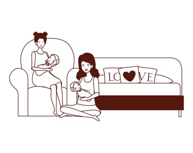 oturma odasında küçük bebekler ile sevimli gebelik anneler