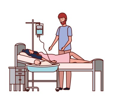 sedye de yeni doğan bebek ile anne ve baba