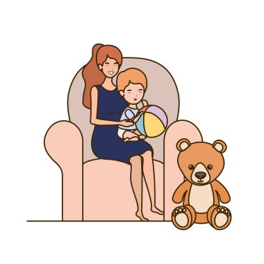 küçük çocuk ile sevimli gebelik anne kanepede oturan