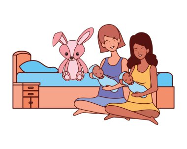 sevimli gebelik anneler yatak odasında küçük bebekler kaldırma oturmuş