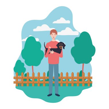 kampta sevimli köpek maskotu kaldırma genç adam