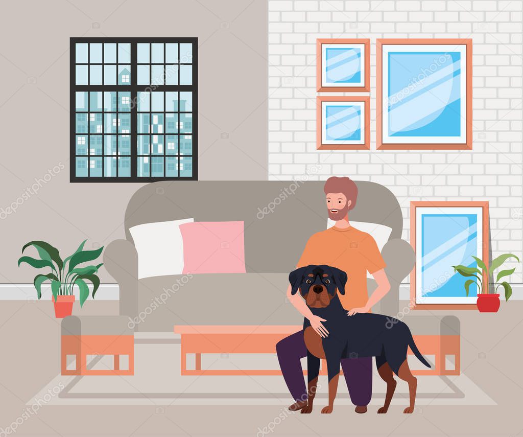 young man with cute dog mascot in the livingroom