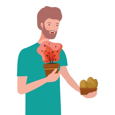 Seramik kapta sonbahar bitkisi olan genç adam.