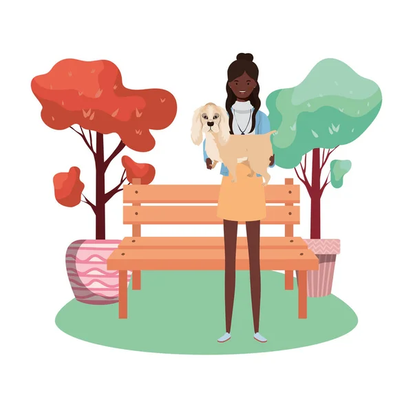 Young afro woman lifting cute dog in the park — Stock Vector