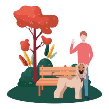 parkta sevimli köpek maskotu ile genç adam