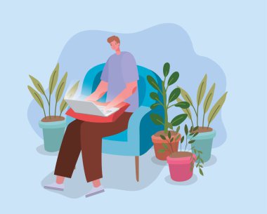 Adam dizüstü bilgisayarla sandalye tasarımında çalışıyor.