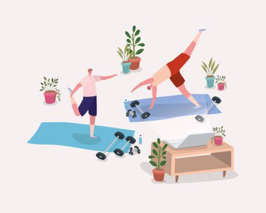 Erkekler dizüstü bilgisayarın önündeki minderlerde yoga yapıyor.