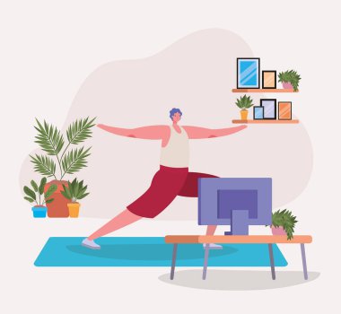 Televizyonun önünde yoga yapan adam.
