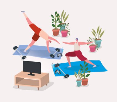 Erkekler TV dizaynı önünde minderlerde yoga yapıyorlar.