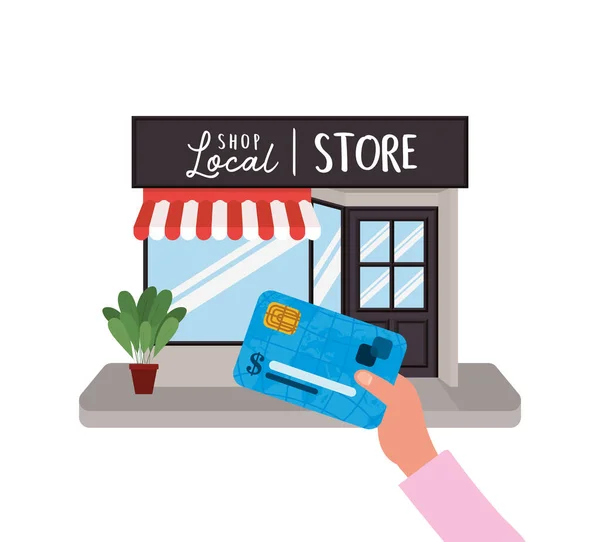 Mano de la celebración de la tarjeta de crédito en frente de diseño de vectores tienda local — Vector de stock