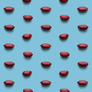 Mavi arka planda yer fıstıkları. Kusursuz doku