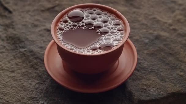 Closeup Pouring Tea Clay Cup — Stock Video