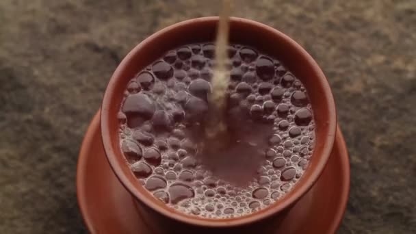 Closeup Pouring Tea Clay Cup — Stock Video