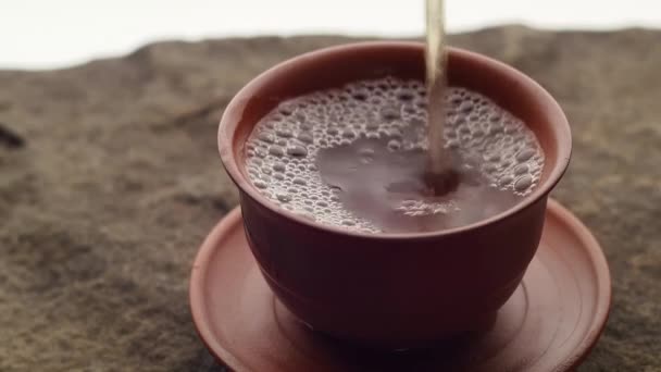 Closeup Pouring Tea Clay Cup — Stock Video