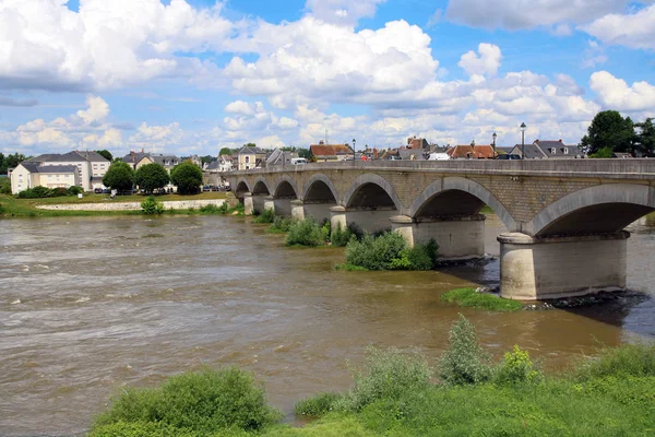 France. Amboise Ancient bridge over the river Loire on a summer day.