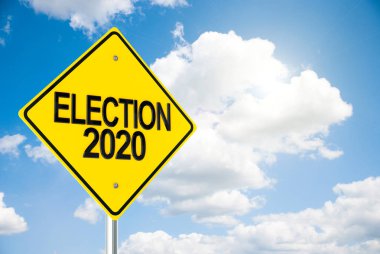 Road sign Election 2020 on sky clipart