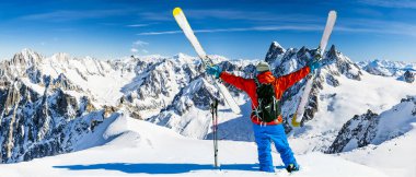 Skiing Vallee Blanche Chamonix with amazing panorama of Grandes Jorasses and Dent du Geant from Aiguille du Midi, Mont Blanc mountain, Haute-Savoie, France clipart
