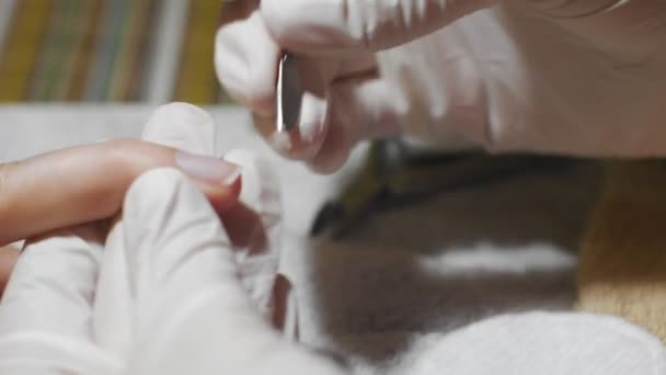 Woman getting nail manicure. Prepare for varnish coating. — Stock Video